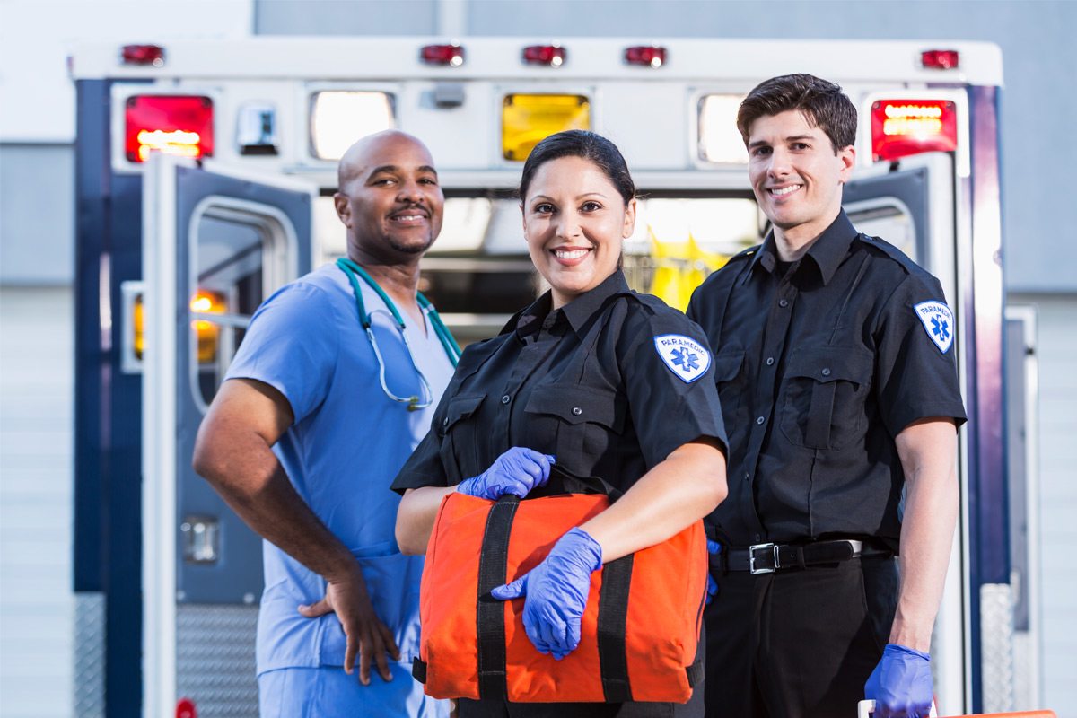 https://urbanalarm.com/wp-content/uploads/2021/03/three-first-responders-ambulance.jpg